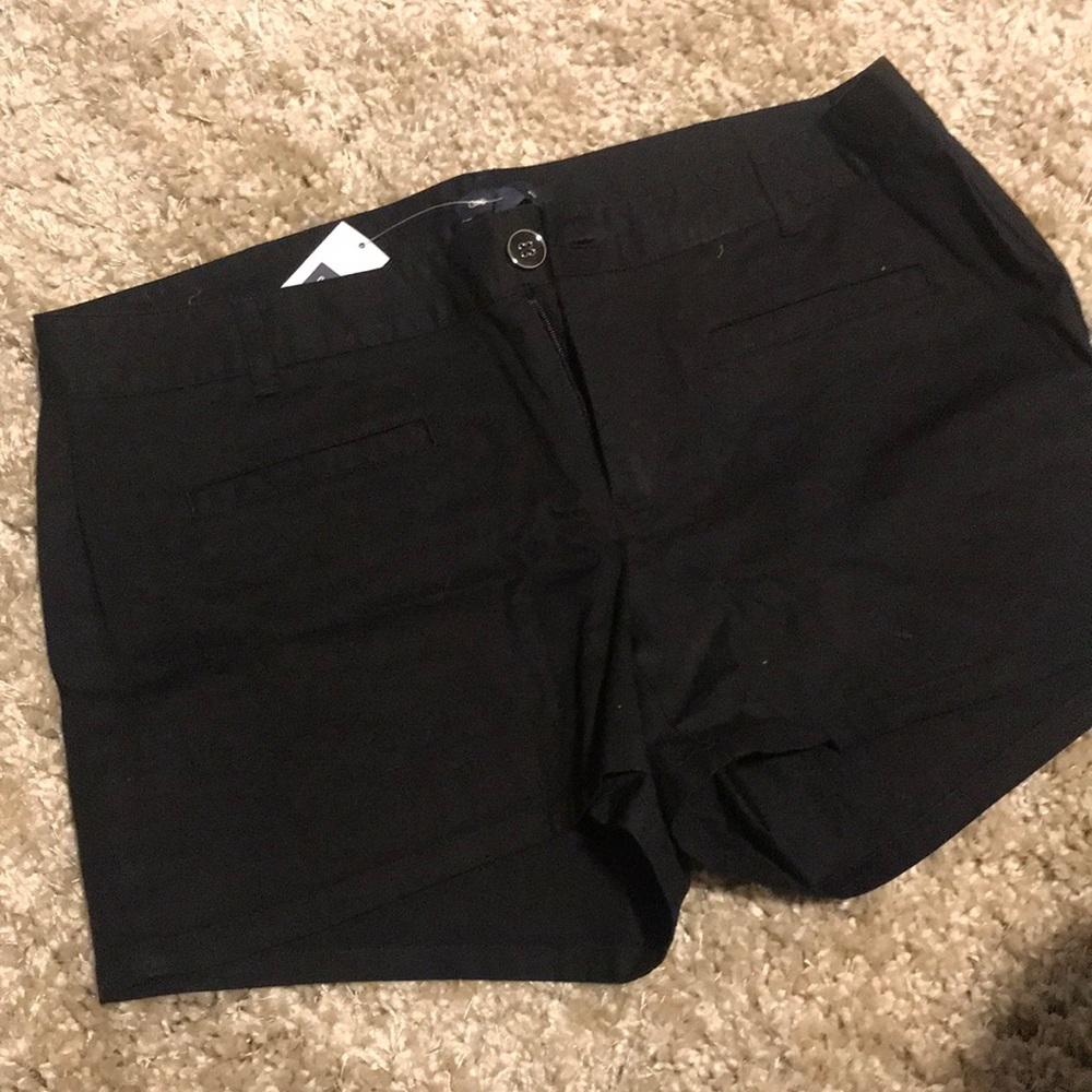 Black shorts.